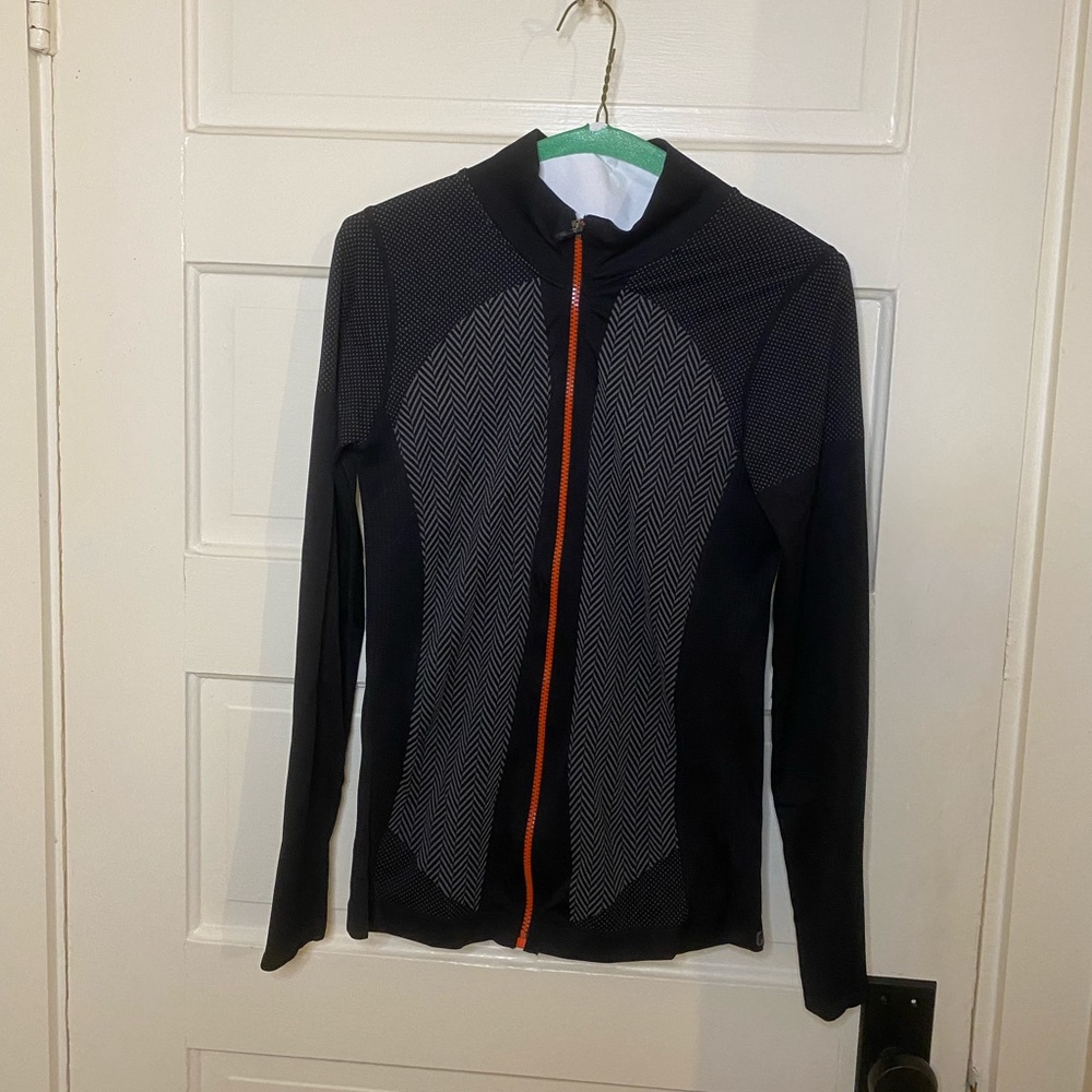Women’s black Fabletics zip up jacket